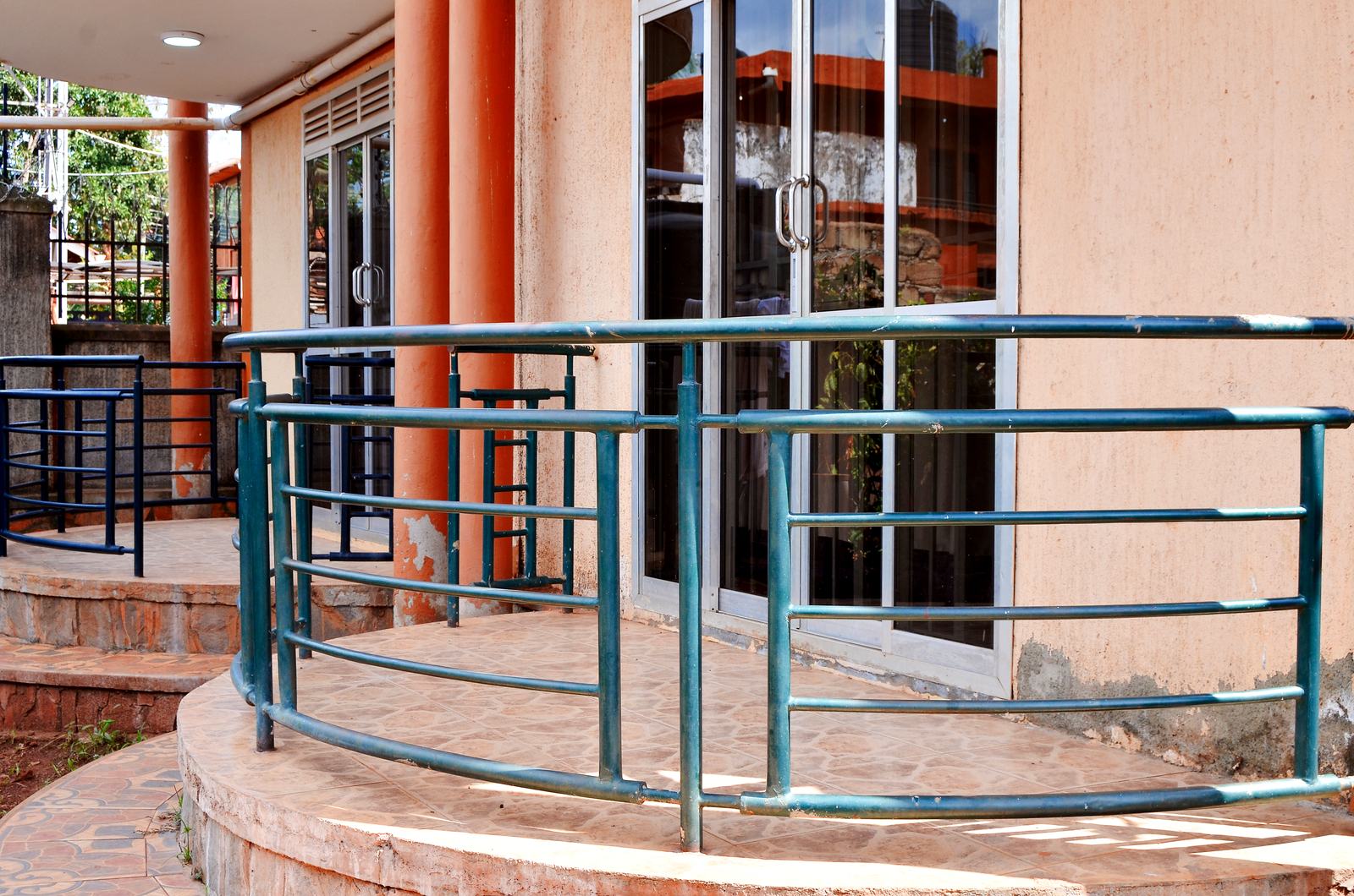 Apartment entrance with curved balcony railing