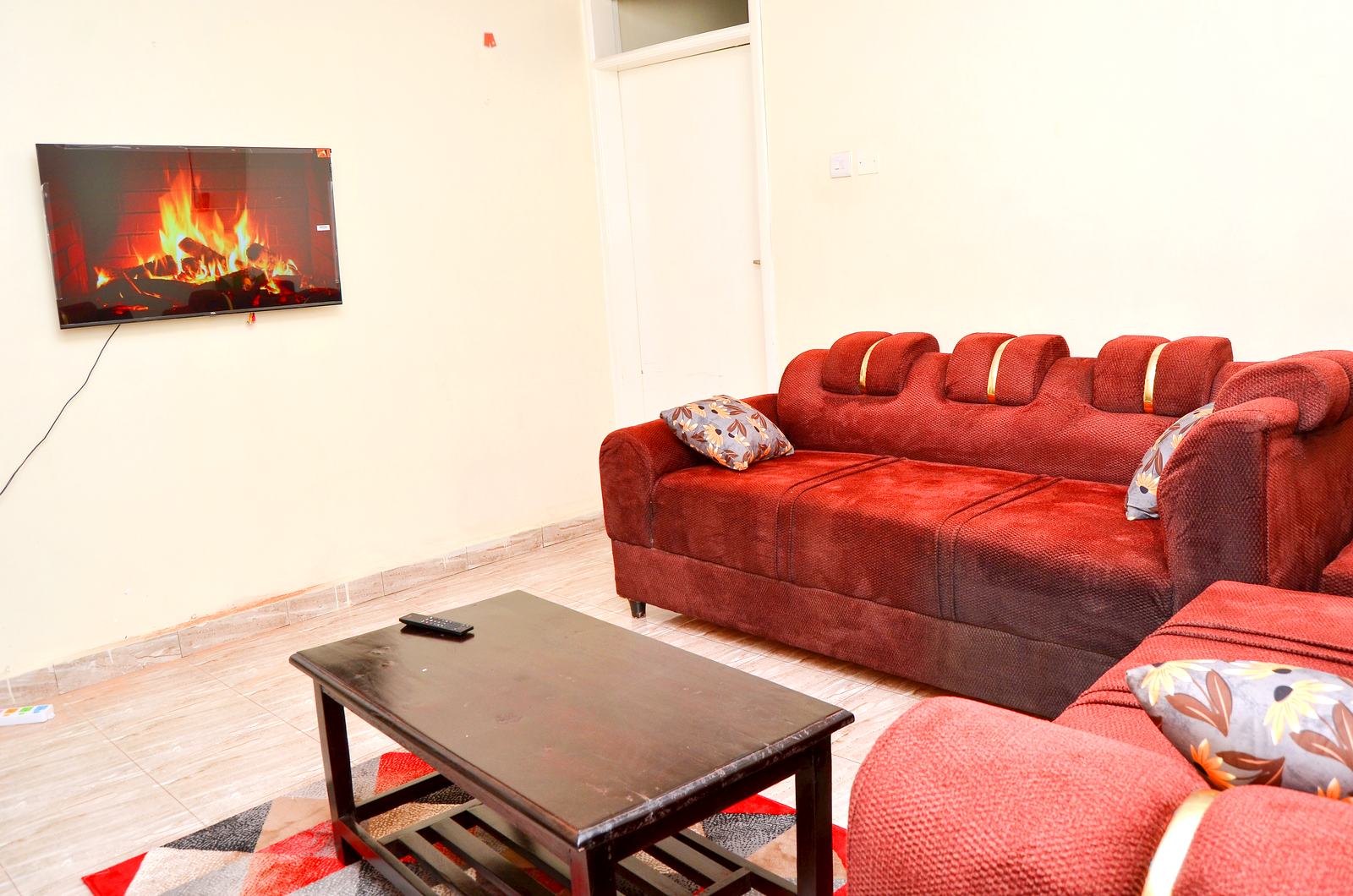 Living room with wall-mounted TV