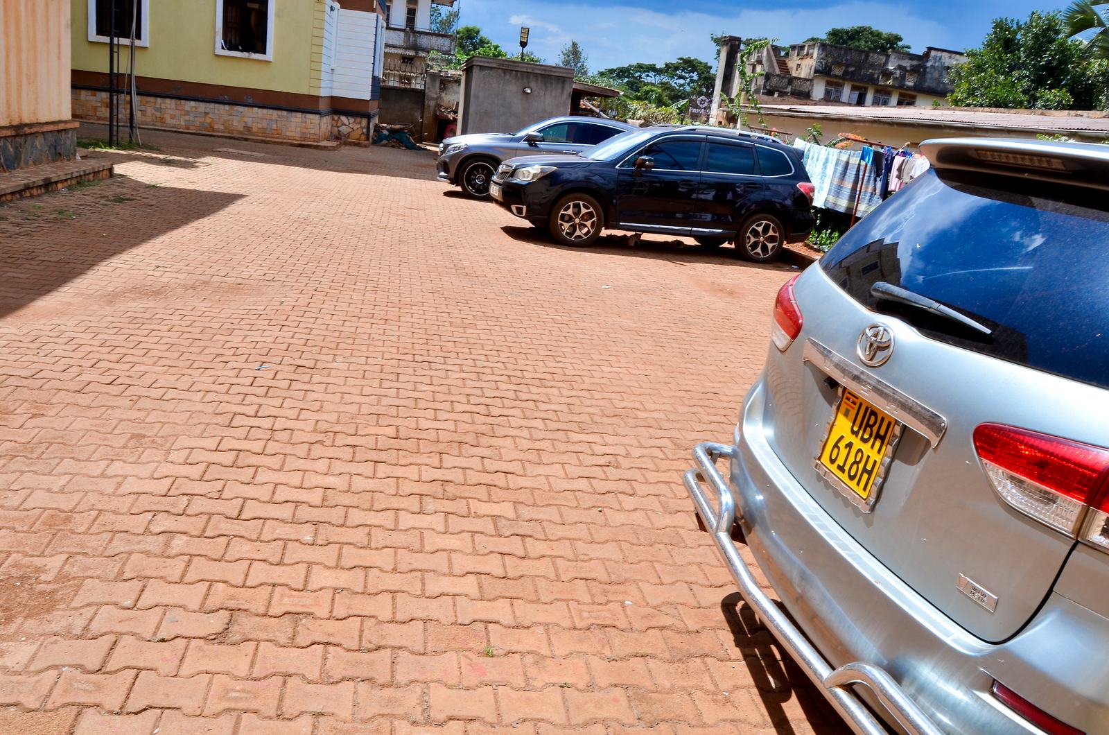 Paved parking area inside the compound